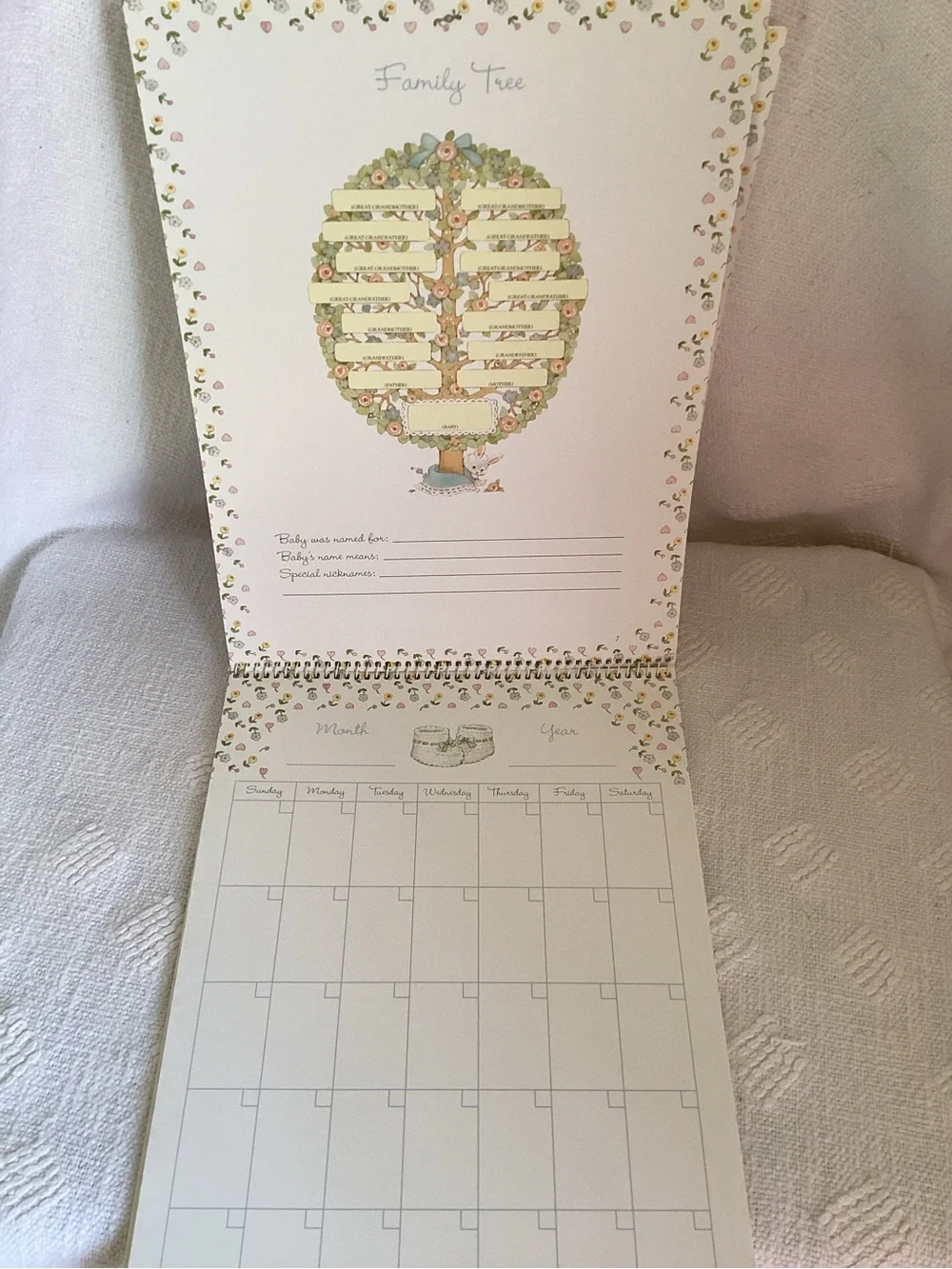 Baby’s first year calendar and milestone hardcover keepsake book